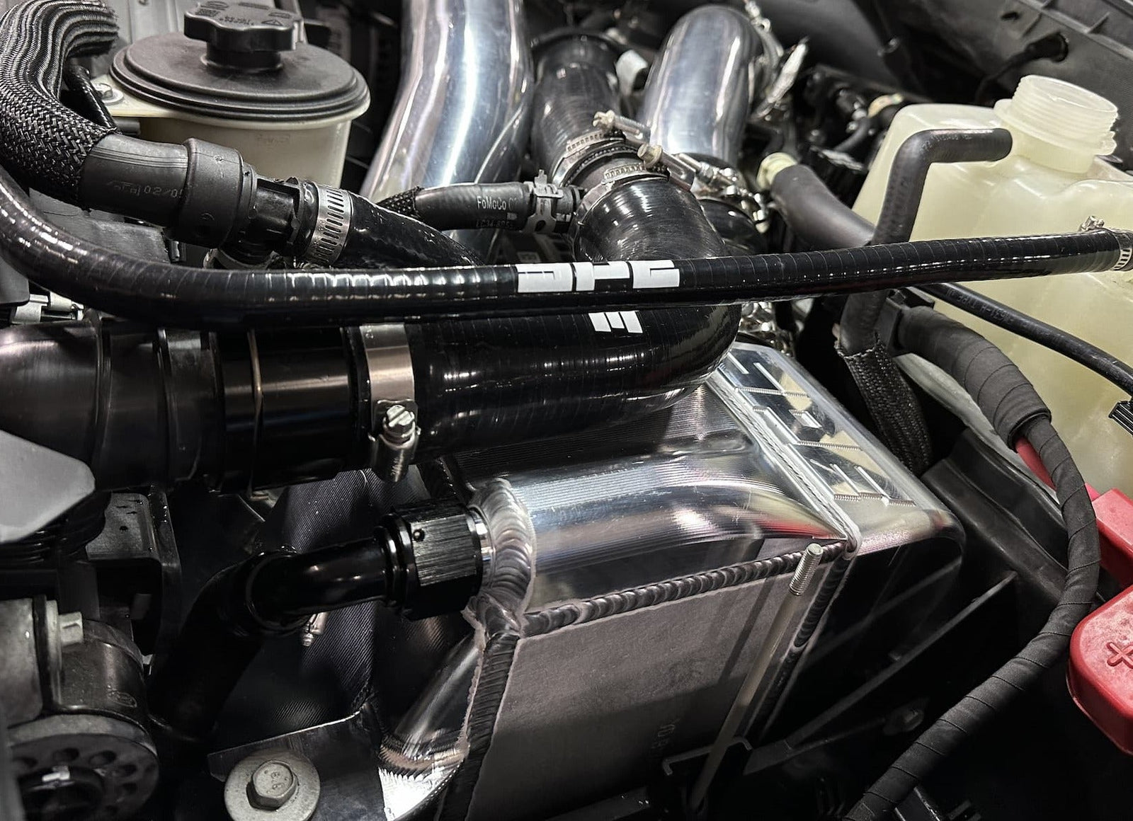 The SPE Booklung Intercooler: Because "Stock" is a Four-Letter Word for "Slow."